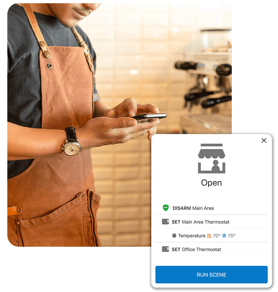 Business owner using the Alert 360 app to manage access scenes
