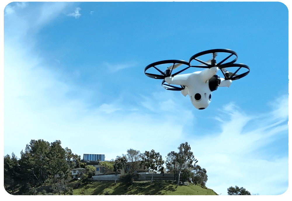 Drone patrol in flight above a protected property